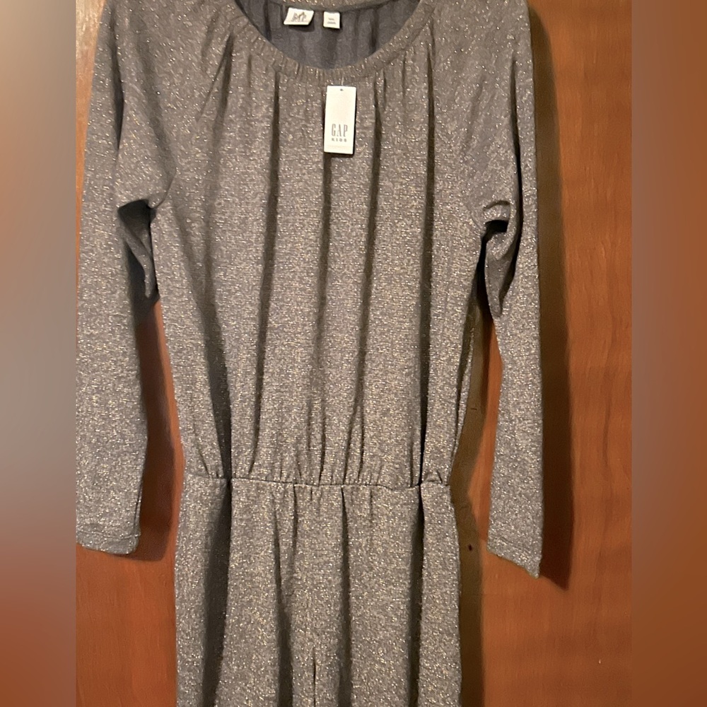 Sparkling gray jumpsuit is an XXL but run small